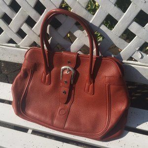 Dark orange Tod's bag.